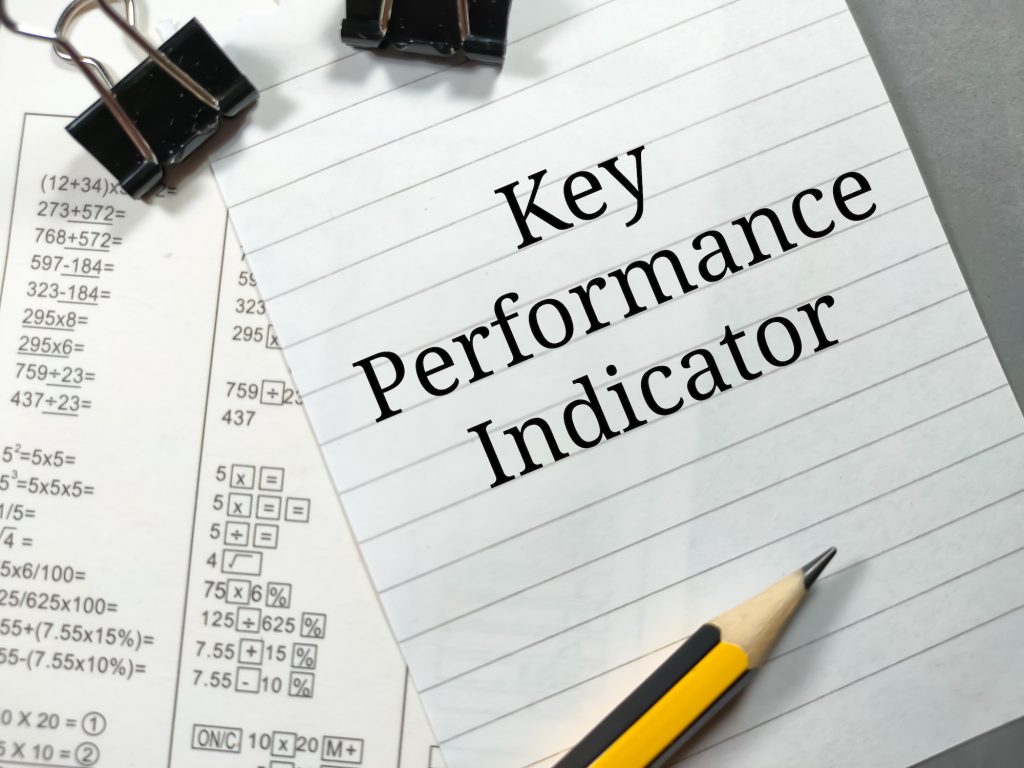 Business concept.Text Key Performance Indicator writing on notepaper.