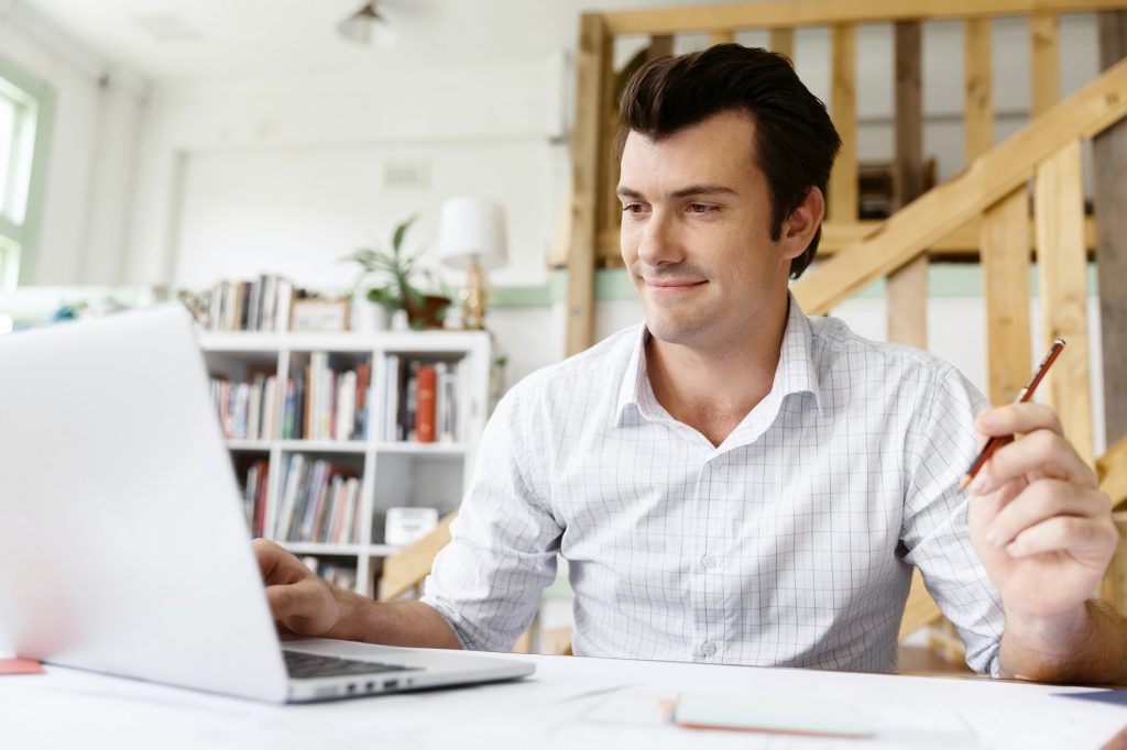 man enjoying the hybrid workplaces